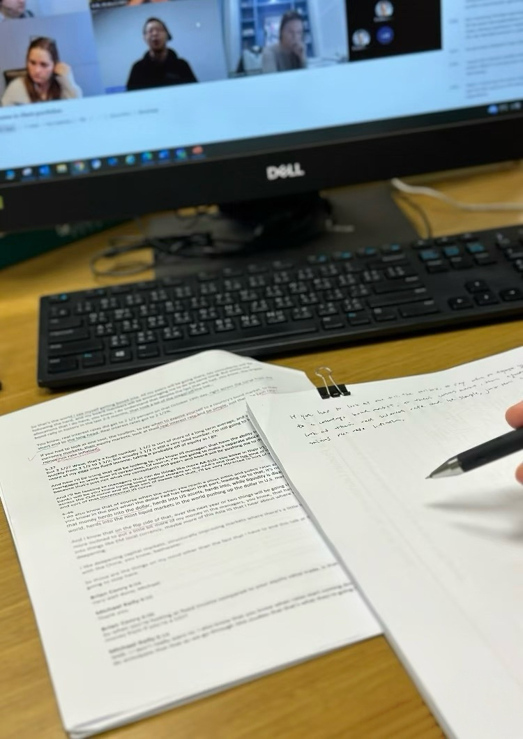 Consultant taking notes while organizing family care planning questions